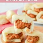 Three homemade Chick Fil A chicken minis on a wood board.