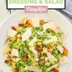Homemade Houston's Caesar salad with spicy Caesar dressing on a white plate.