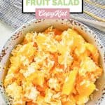 Homemade Luby's ambrosia salad and a cloth napkin.