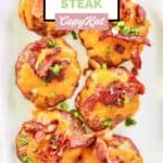 Homemade Luby's sausage steaks on a rectangular platter.