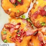 Four homemade Luby's sausage steaks on a platter.