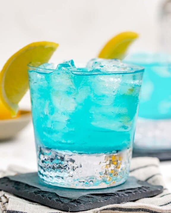 Copycat Olive Garden Blue Amalfi drink on a coaster.