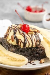Copycat Olive Garden brownie banana funtastico and a bowl of cherries.