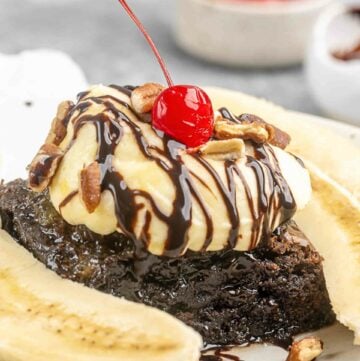 Copycat Olive Garden brownie banana funtastico and a bowl of cherries.