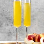 Two copycat Olive Garden peach bellini drinks.
