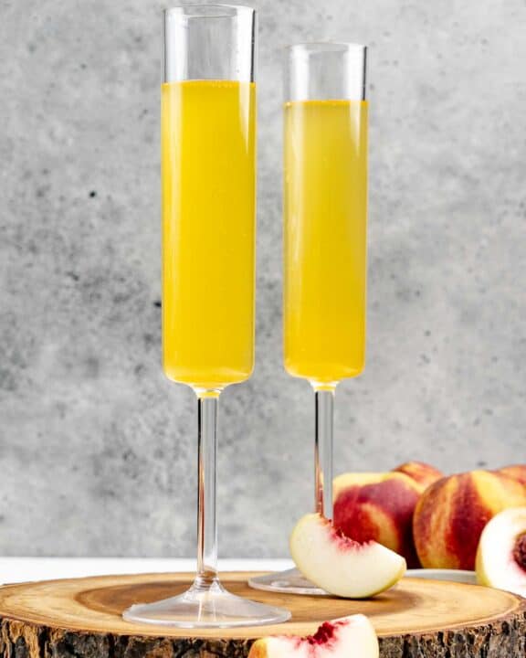 Two copycat Olive Garden peach bellini drinks.
