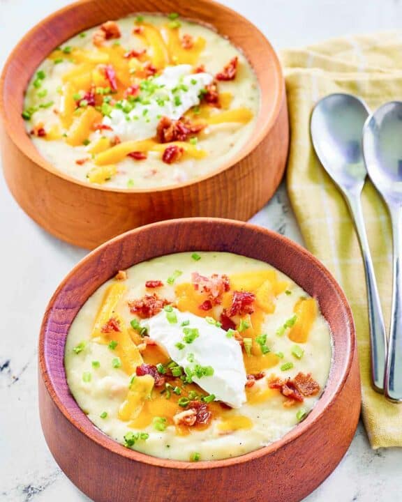 Copycat Panera baked potato soup in two bowls.