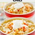 Homemade Ruby Tuesday white chicken chili garnished with cheese and sour cream.