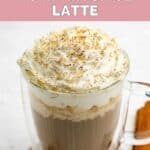 Homemade Starbucks pumpkin spice latte in an insulated coffee mug.