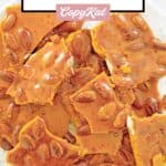 Almond brittle candy on a serving plate.