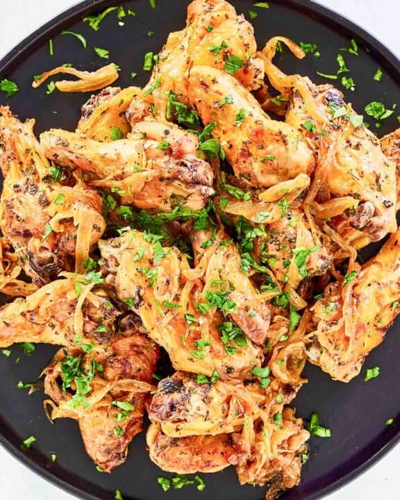 Copycat Anthony's coal fired wings on a large plate.