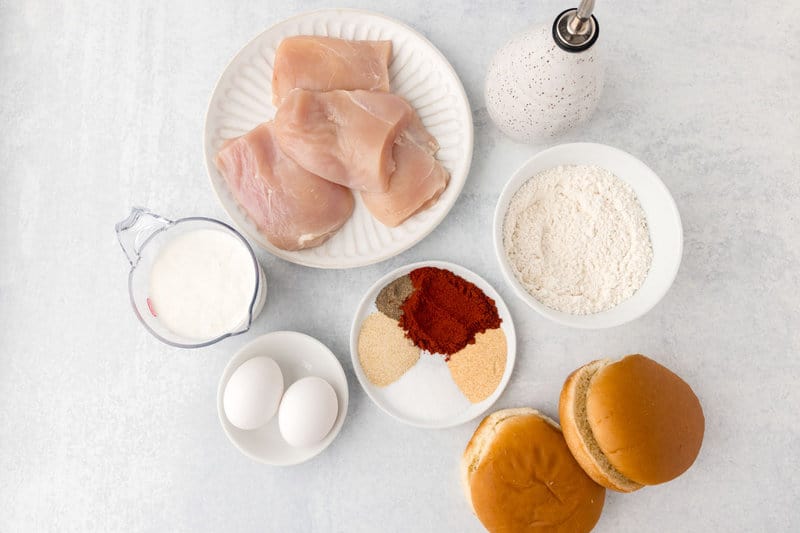 Copycat Burger King BK royal chicken sandwich ingredients on a marble surface.