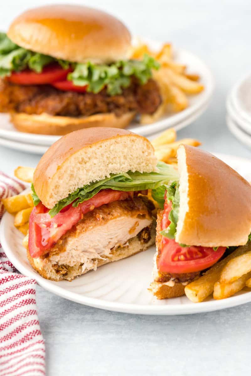 Copycat Burger King BK royal crispy chicken sandwich cut in half on a plate.