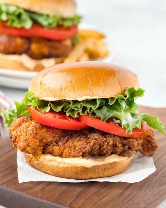 Copycat Burger King BK royal crispy chicken sandwich on a wood board.