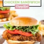 Homemade BK royal crispy chicken sandwich on a small wood board.