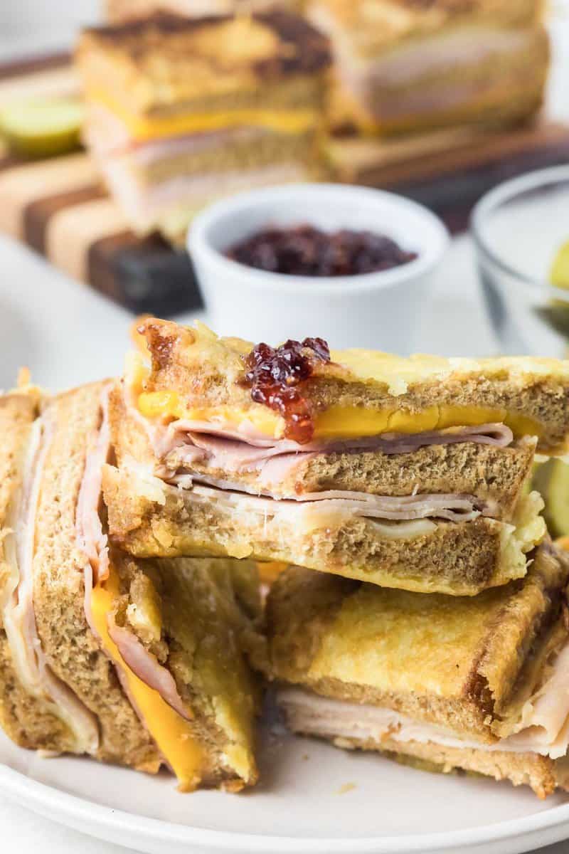 Copycat Bennigan's Monte Cristo sandwich with raspberry jam.