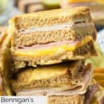 Two slices of homemade Bennigan's Monte Cristo sandwich in a stack.
