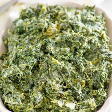 Copycat Boston Market creamed spinach in a baking dish.