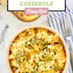 Homemade Cracker Barrel broccoli cheese casserole and a fork on a napkin.