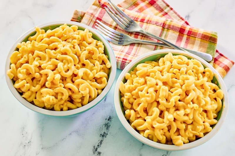 Copycat Cracker Barrel mac and cheese in two bowls and two forks next to them.