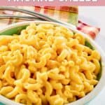 A bowl of homemade Cracker Barrel mac and cheese and a cloth napkin.