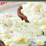 Toast covered with creamed eggs.