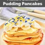 Homemade IHOP minion pancakes with a knife and fork behind it.