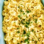 Instant Pot risotto with garlic and parmesan cheese in a serving dish.