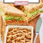 A small bowl of Loma Linda sandwich spread, spreader knife, and sandwiches.