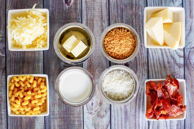Copycat Longhorn Steakhouse mac and cheese ingredients in bowls.