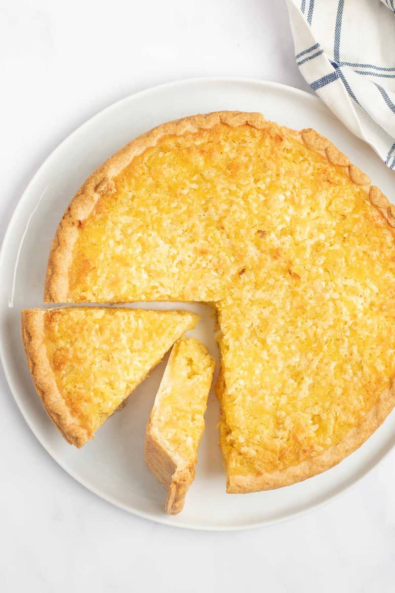 Copycat Luby's Hawaiian pie with two slices cut out of it.