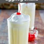 Homemade McDonald's eggnog shake, straws, and cherries.