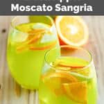 Homemade Olive Garden green apple moscato wine sangria in two glasses.