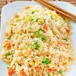 Homemade Panda Express fried rice and chopsticks on a plate.