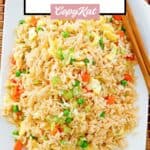 Homemade Panda Express fried rice and chopsticks on a large plate.