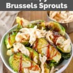 A bowl of homemade Red Lobster crispy Brussels sprouts topped with fried onions.