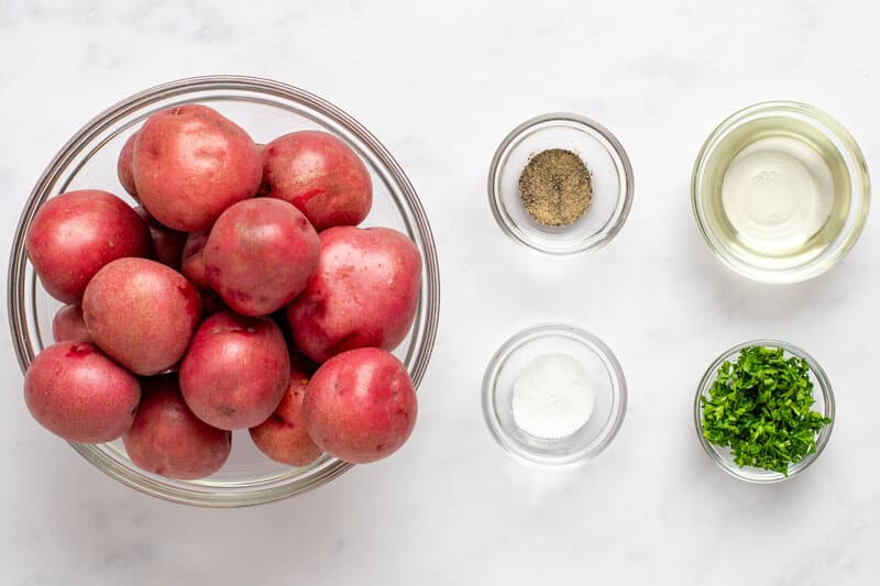 Roasted red potatoes ingredients in bowls.