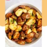 A bowl of oven roasted red potatoes.