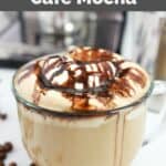 Homemade Starbucks cafe mocha latte topped with whipped cream and chocolate drizzle.