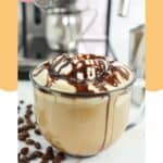 Homemade Starbucks cafe mocha with whipped cream and chocolate drizzle on top.