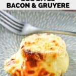 Homemade Starbucks bacon and gruyere egg bite and a fork on a plate.