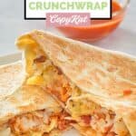 Copycat Taco Bell breakfast crunchwrap with bacon egg and cheese on a plate.