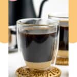 Vietnamese coffee in an insulated coffee mug.