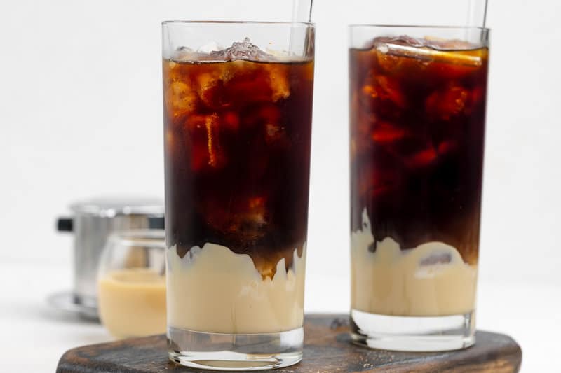 Vietnamese iced coffee in two tall glasses.
