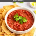 Homemade Chili's salsa and corn tortilla chips on a platter.