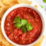Tortilla chips and a bowl of homemade Chili's salsa.