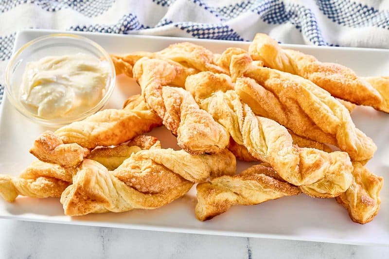 Copycat Cinnabon cinnamon stix and cream cheese frosting dipping sauce.