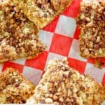 Homemade heath bar cake slices on parchment paper.