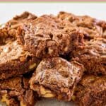 Homemade Hershey's brownies with nuts on a plate.
