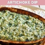 Homemade Houston's spinach artichoke dip in a ceramic serving dish.